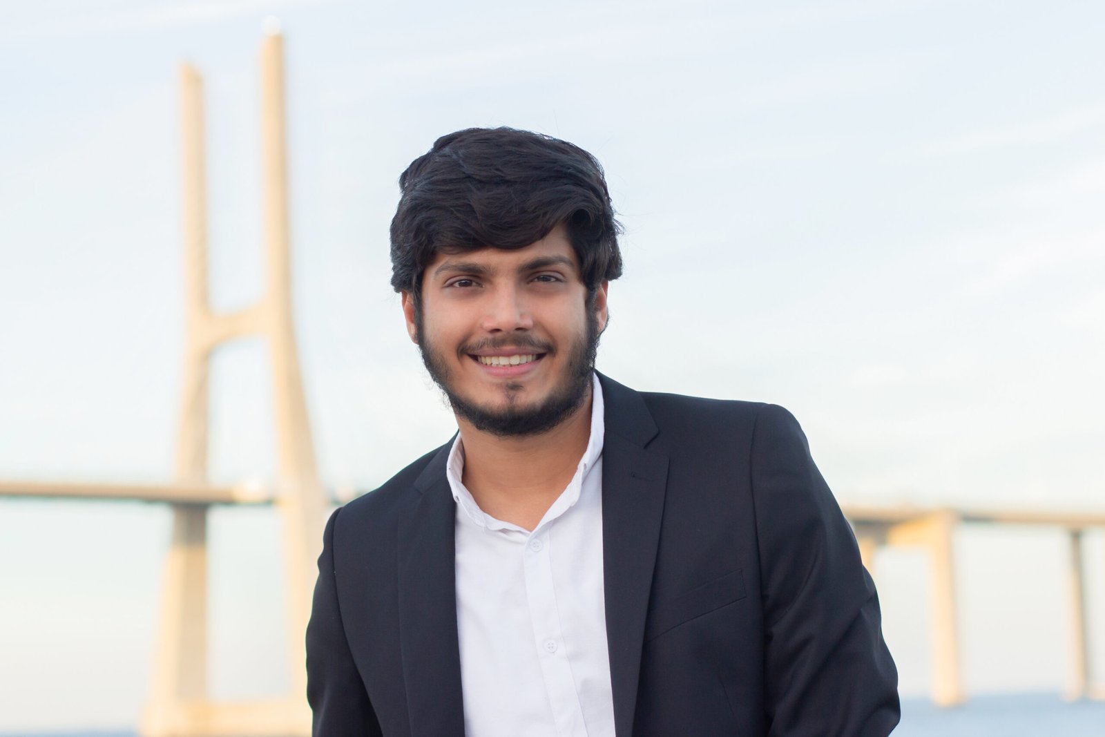 Home portrait of good looking smiling arabic man in suit